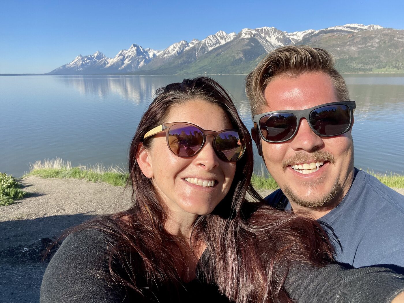 Jesse and Karlee at Jackson Lake, the Tetons behind them